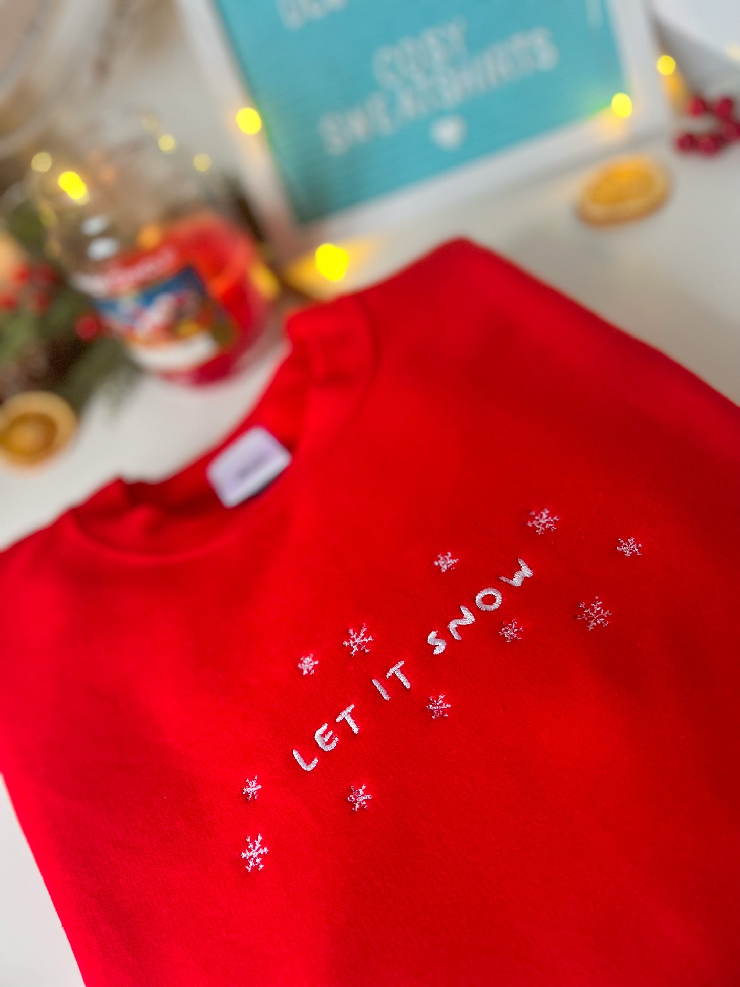 Sudadera navideña Let it Snow
